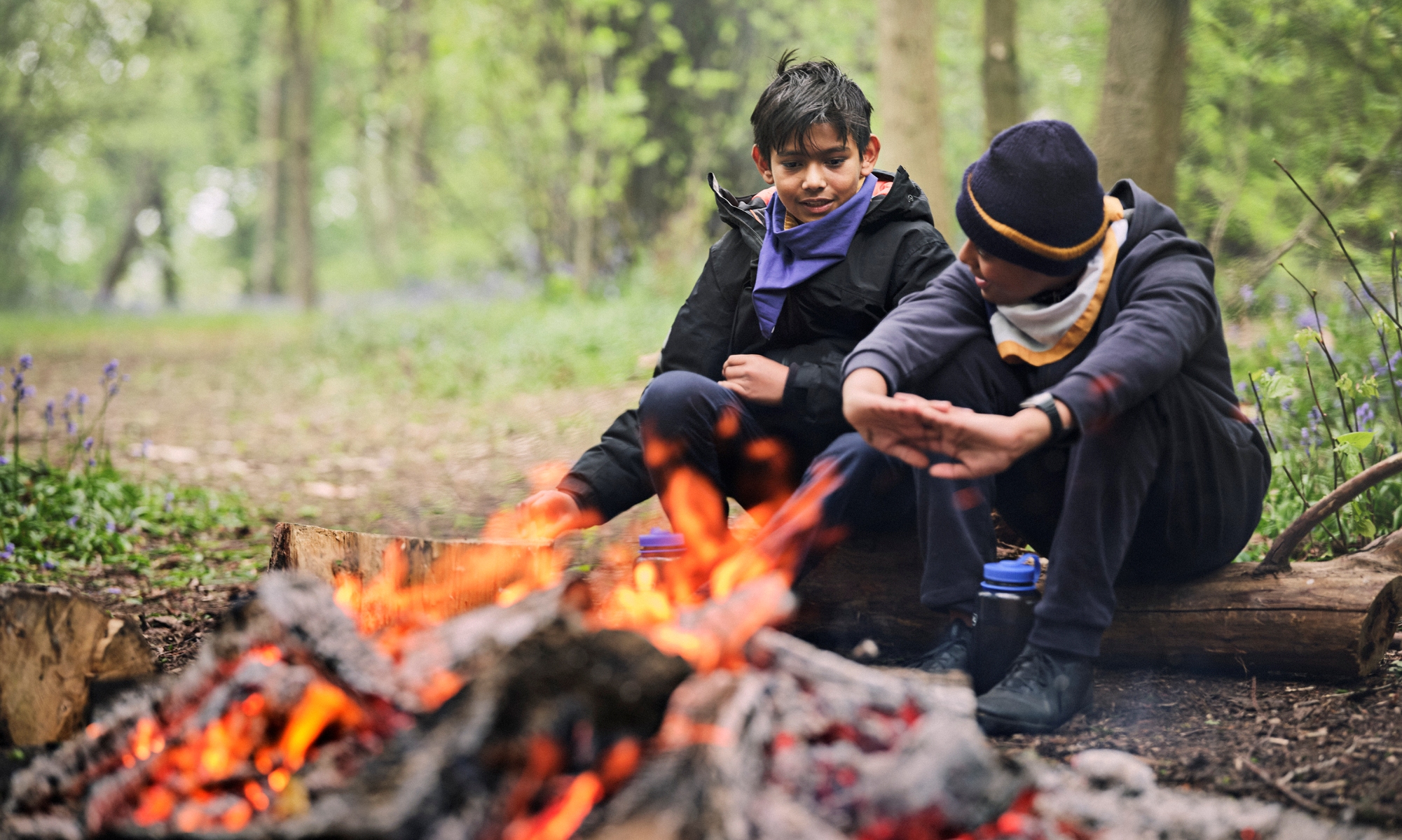 Scouts around fire